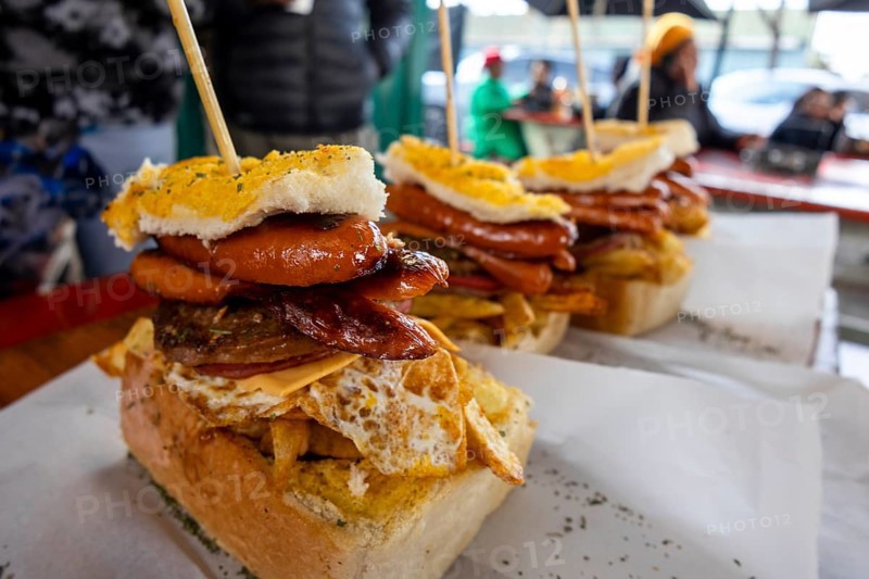 The iconic Soweto Kota — a true south african street food masterpiece. loaded with chips, eggs, sausage, and more, it's a taste of township culture in every bite