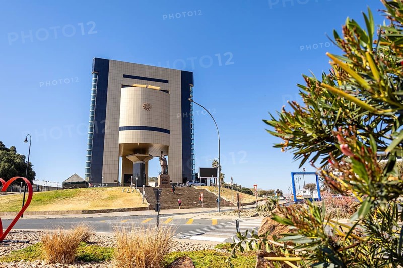 The Independence Memorial Museum in Windhoek, Namibia, honors Dr. Sam Nujoma and the country's journey to independence. His statue overlooks the city, and inside, exhibits tell Namibia's story