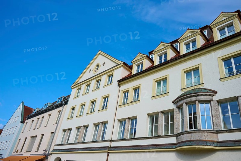 Multi-storey building under a bright blue sky with skylights, Regensburg, Bavaria, Germany