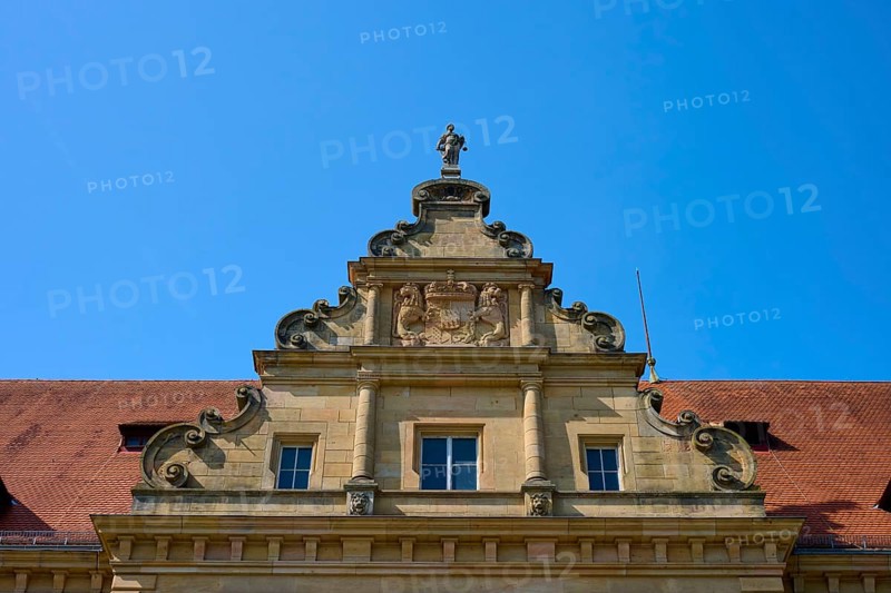 Baroque building front with sculptures and decorative stone ornaments under a clear sky, district court, regional court, Regensburg, Bavaria, Germany