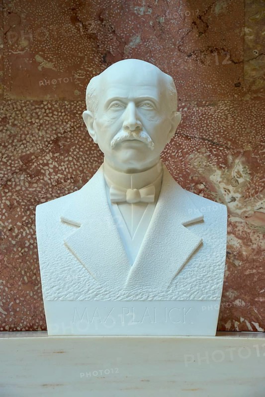 Marble bust of Max Planck with bow tie against a reddish background, Walhalla, Donaustauf, Regensburg, Bavaria, Germany