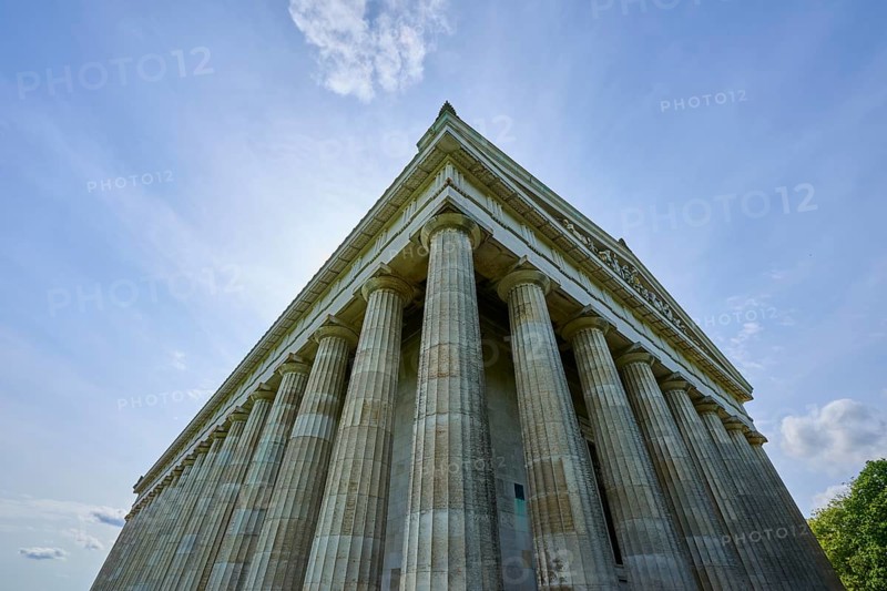 Impressive columned building that stands out against a light-flooded sky, Walhalla, Donaustauf, Regensburg, Bavaria, Germany
