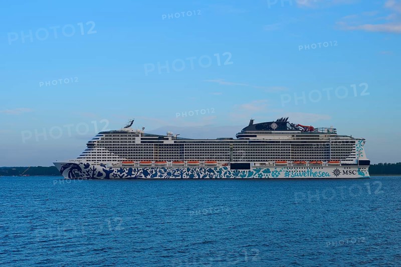 Cruise ship, MSC Euribia, sailing through the vastness of the ocean under a blue sky, Heikendorf, Plön district, Kiel Fjord, Schleswig-Holstein, Germany