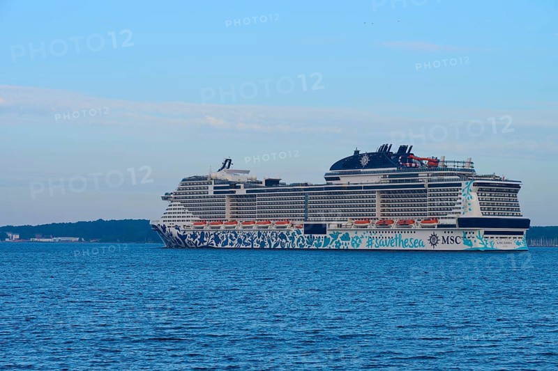 Cruise ship, MSC Euribia, sailing across the open sea in the distance, Heikendorf, Plön district, Kiel Fjord, Schleswig-Holstein, Germany