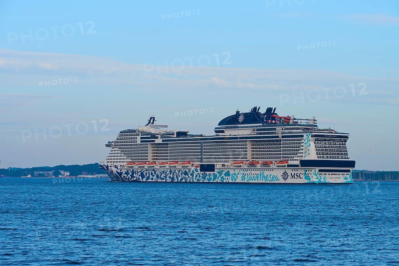 A large cruise ship, MSC Euribia, on the sea with blue sky and clouds, Heikendorf, Plön district, Kiel Fjord, Schleswig-Holstein, Germany