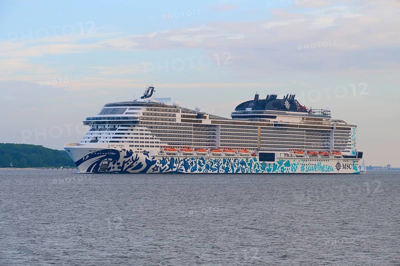 Impressive cruise ship, MSC Euribia, on the sea under a slightly cloudy sky, Heikendorf, Plön district, Kiel Fjord, Schleswig-Holstein, Germany