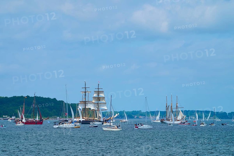 Numerous yachts and sailing ships sailing under a slightly cloudy sky, Windjammer Parade Kiel 2025, Heikendorf, Plön district, Kiel Fjord, Schleswig-Holstein, Germany