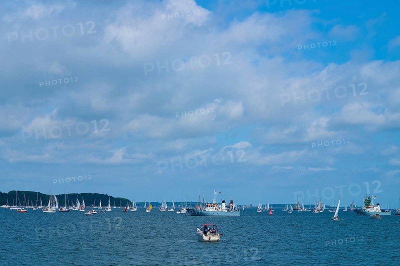 Scattered boats on the sea under a cloudy blue sky, wide visible, Windjammer Parade Kiel 2025, Heikendorf, Plön district, Kiel Fjord, Schleswig-Holstein, Germany