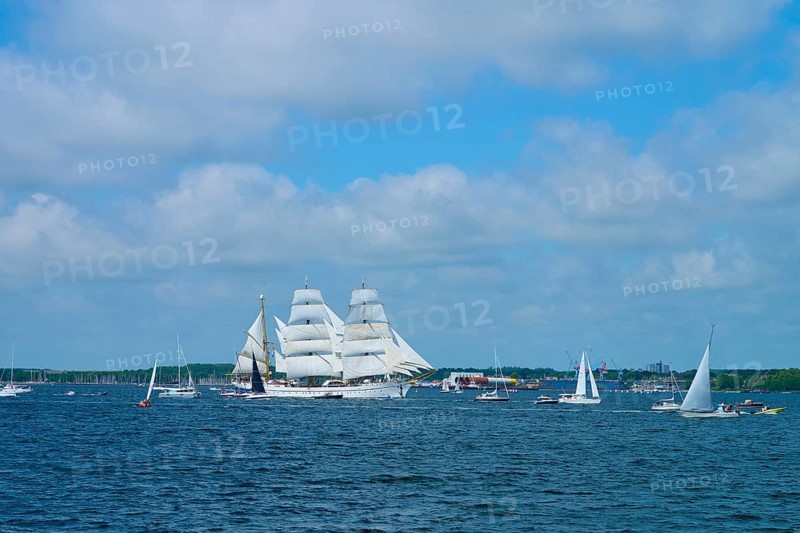 A magnificent tall ship Gorch Fock with white sails in a field of boats, Windjammer Parade Kiel 2025, Heikendorf, Plön district, Kiel Fjord, Schleswig-Holstein, Germany