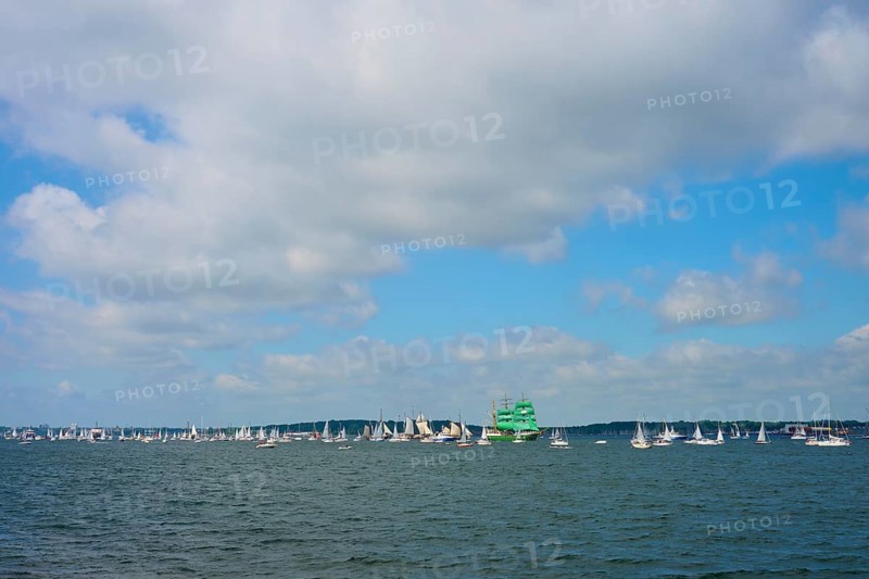 Numerous sailing boats on the sea under a slightly cloudy sky, Windjammer Parade Kiel 2025, Heikendorf, Kreis Plön, Kieler Förde, Schleswig-Holstein, Germany