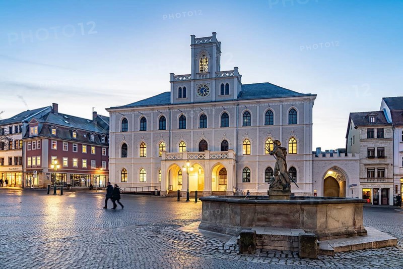 The town hall and Neptune fountain on the market square at dusk, Weimar, Thuringia, Germany