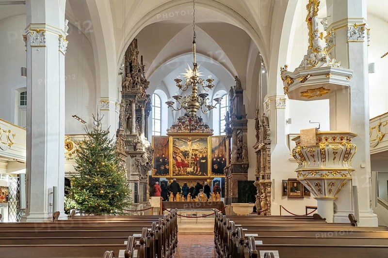 Interior of the Herderkirche with the altarpiece Christ on the Cross by Lucas Cranach in Weimar, Thuringia, Germany