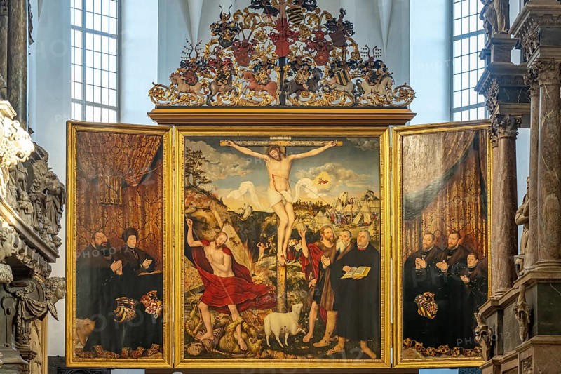 Three-panelled altarpiece Christ on the Cross by Lucas Cranach in the Stadtkirche St. Peter & Paul or Herderkirche in Weimar, Thuringia, Germany