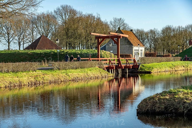 Moat and drawbridge of the inhabited former Bourtange fortress, Groningen, Netherlands