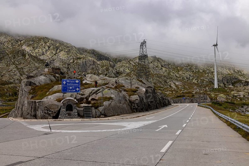 Road junction at the top of the Gotthard Pass, junction to Milan and Bellinzona and to Lucerne and Zurich, Ticino, Switzerland
