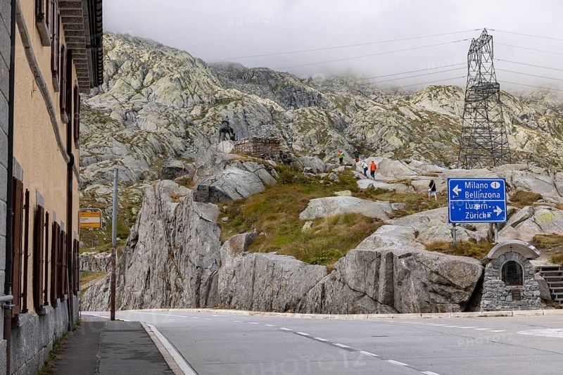 Road junction at the top of the Gotthard Pass, junction to Milan and Bellinzona and to Lucerne and Zurich, Ticino, Switzerland