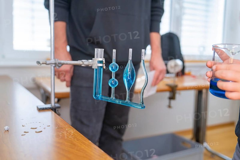 Measuring device with blue liquid in a laboratory for experimental purposes, Youth Research Centre