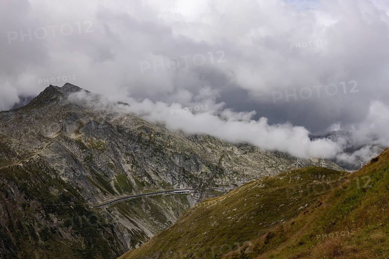 Clouds and view of Gotthard pass road, Passo Scimfuss, Ticino, Switzerland