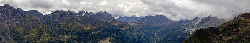 Panoramic view over the Val Bedretto, on the left Cristallina area with Basodino glacier, on the right pass road at the Nufenen Pass, Airolo, Ticino, Switzerland