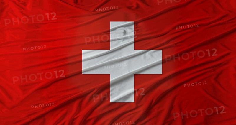 Swiss flag waving. Flag of Switzerland with cloth texture