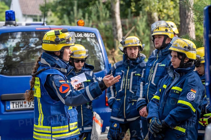 Civil defence exercise scenario, after a drone attack on a residential area, emergency services clear the area, at the large-scale exercise FÜLEX25, of the THW, Technisches Hilfswerk, Landesverband North Rhine-Westphalia, on 4 weekends over 3500 volunteers from the 127 North Rhine-Westphalia local associations practice many different deployment scenarios, from the field of disaster control and civil defence