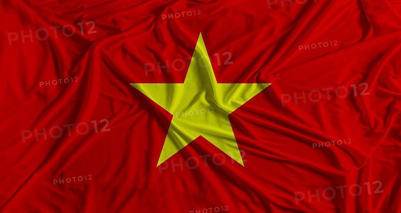 Vietnamese flag with fabric texture background. National flag of Vietnam