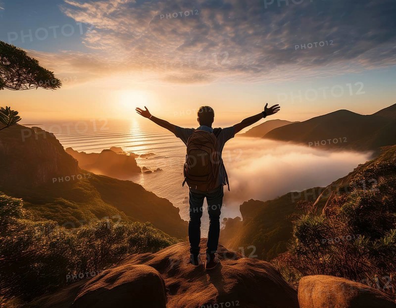 A serene scene of a person on a mountain summit, watching the sunrise over misty valleys, conveys peacefulness and freedom, AI generated