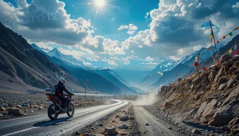 A motorcyclist is seen riding on a winding road through a majestic mountain valley, with prayer flags adding a cultural touch, AI generated