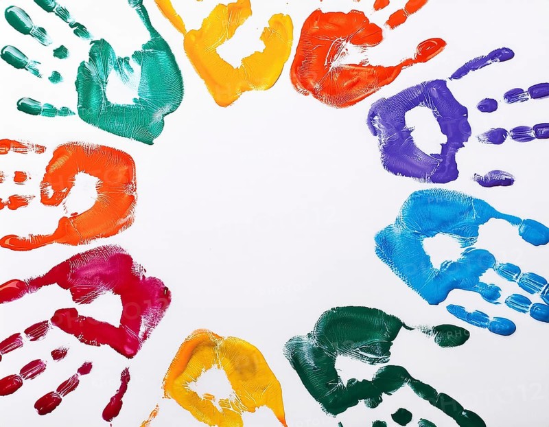 Brightly colored handprints in various hues arranged artistically on a textured white surface, evoking creativity, fun, and the spirit of collaboration or children's artistry, AI generated