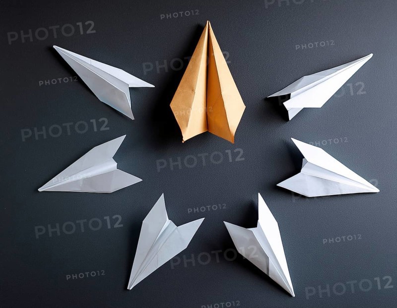 Six colorful origami paper airplanes are displayed in a creative arrangement on a bright background, emphasizing creativity, symmetry, and vibrant artistic expression. Perfect for themes related to art, craft, and fun, AI generated