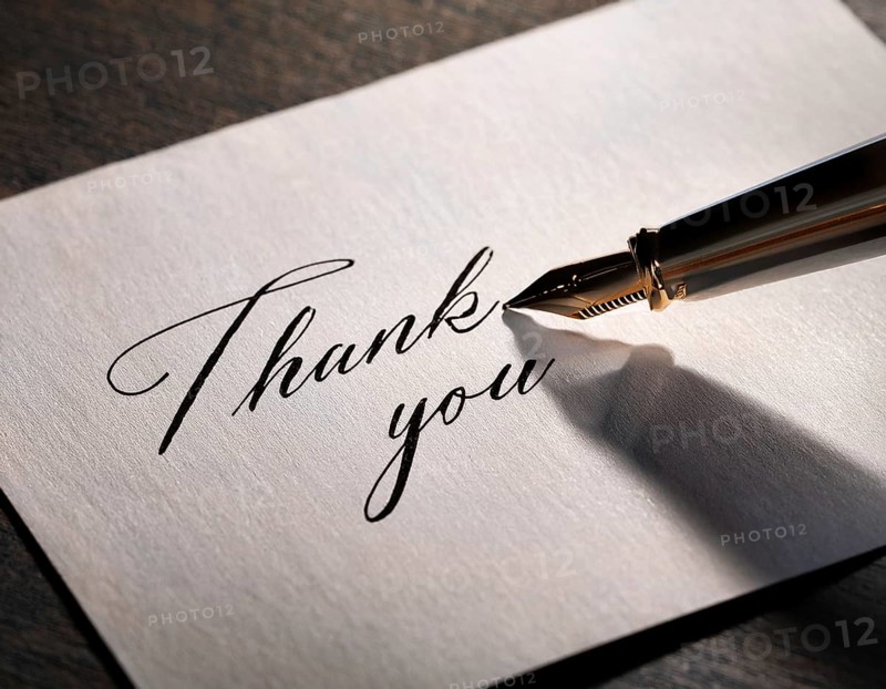 Elegant pen rests alongside a handwritten Thank You card on a wooden surface in soft light. Emphasizing gratitude, personal touch, and communication through traditional methods, AI generated