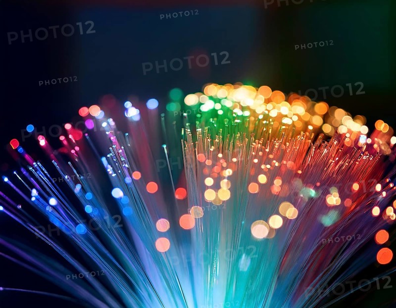 Glowing fiber-optic lights in vivid colors, creating a futuristic and dynamic visual effect, ideal for technology, AI generated