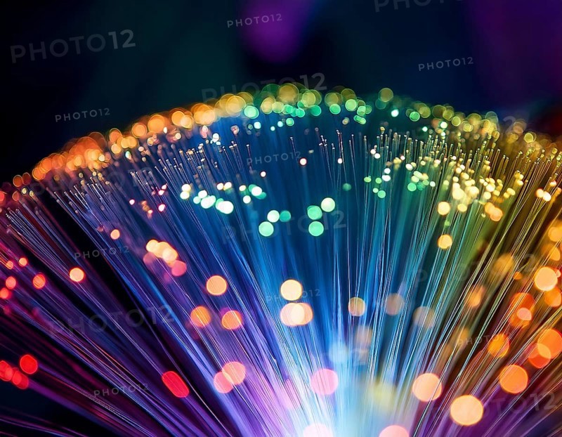 Glowing fiber-optic lights in vivid colors, creating a futuristic and dynamic visual effect, ideal for technology, AI generated