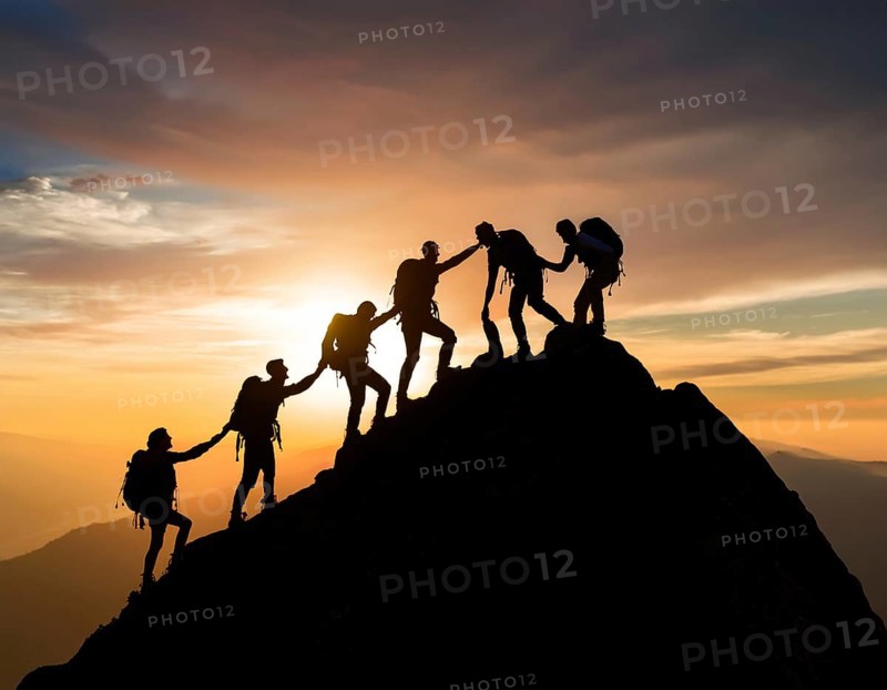 A dynamic depiction of teamwork and determination, climbers ascend a rugged mountain peak during sunset, silhouetted against a vibrant, colorful sky, AI generated