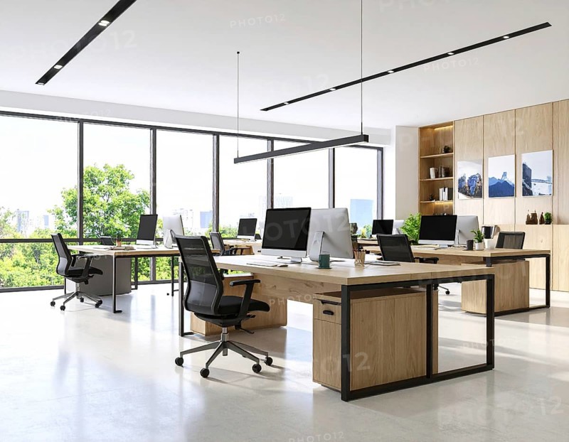 Modern coworking space with laptops, coffee cups, plants, and daylight showcasing minimal interior design and productivity, AI generated