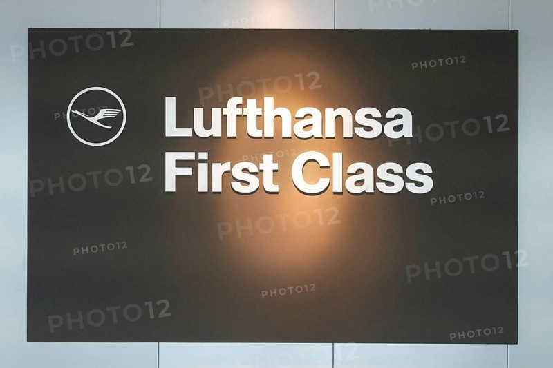 Illuminated sign in the airport for a lounge with the inscription Lufthansa First Class, Frankfurt, Germany