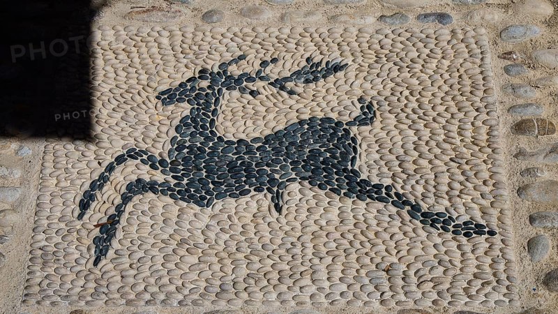 Mosaic artwork of a deer made of pebbles in the street, Turkish Quarter, Rhodes Old Town, Rhodes Town, Rhodes, Dodecanese, Greek Islands, Greece