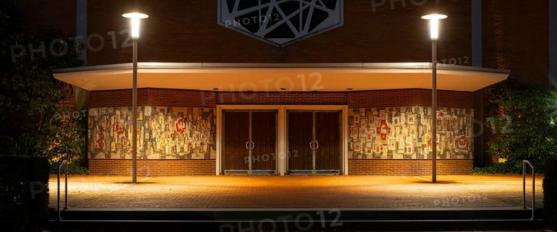 Night shot of the main entrance to the parish church of St Peter and Paul, Neustadt am Rübenberge, Hanover, Lower Saxony, Germany