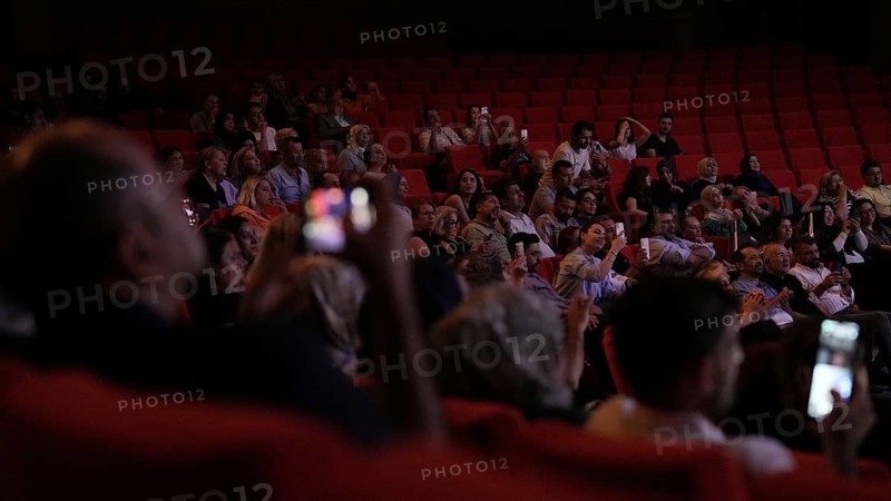 Audience members dance and clap as Turkish singer Coskun Sabah performs during the Türkiye Kültür Yolu Festival, Gaziantep, Gaziantep, Türkiye