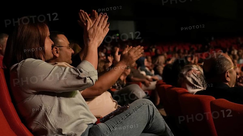 Audience members dance and clap as Turkish singer Coskun Sabah performs during the Türkiye Kültür Yolu Festival, Gaziantep, Gaziantep, Türkiye