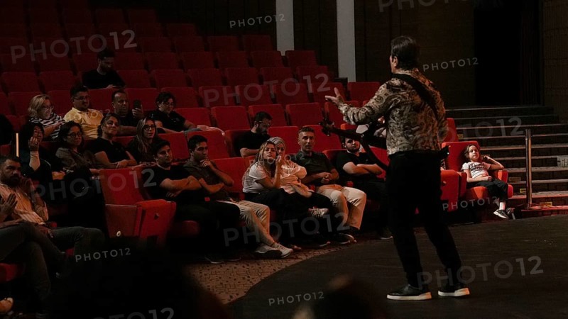 Audience members dance and clap as Turkish singer Coskun Sabah performs during the Türkiye Kültür Yolu Festival, Gaziantep, Gaziantep, Türkiye