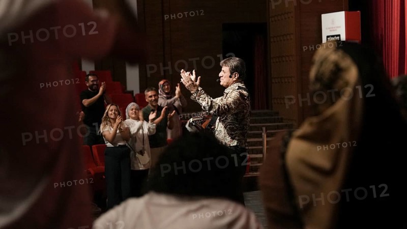 Turkish singer Coskun Sabah performs on stage at Gaziantep University as part of the Türkiye Kültür Yolu Festival. The concert reflects the festival's aim to celebrate music and cultural heritage through live performances across the city, Gaziantep, Gaziantep, Türkiye