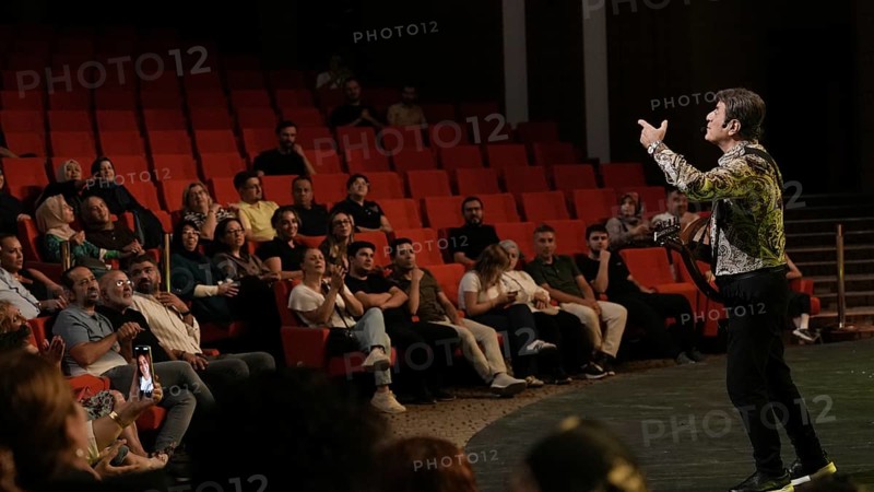 Audience members dance and clap as Turkish singer Coskun Sabah performs during the Türkiye Kültür Yolu Festival, Gaziantep, Gaziantep, Türkiye