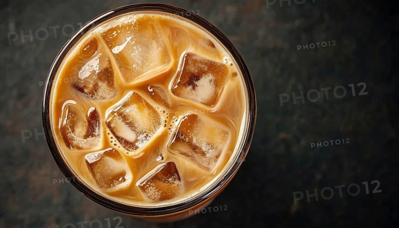 Top-Down View Of Iced Milk Coffee On Black Background: Close-Up Of Refreshing Drink Served Cold And Ready To Enjoy, AI generated