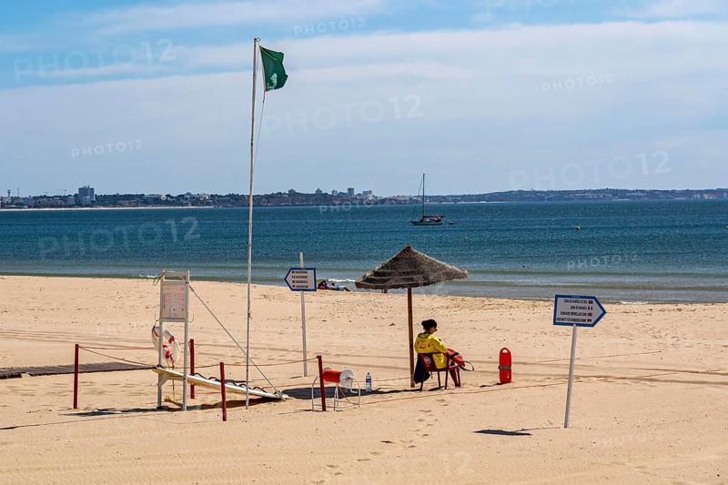 The Praia de São Roque beach, east of Lagos town centre, quite empty, lifeguards on duty, off-season, in the west of the Algarve, Portugal