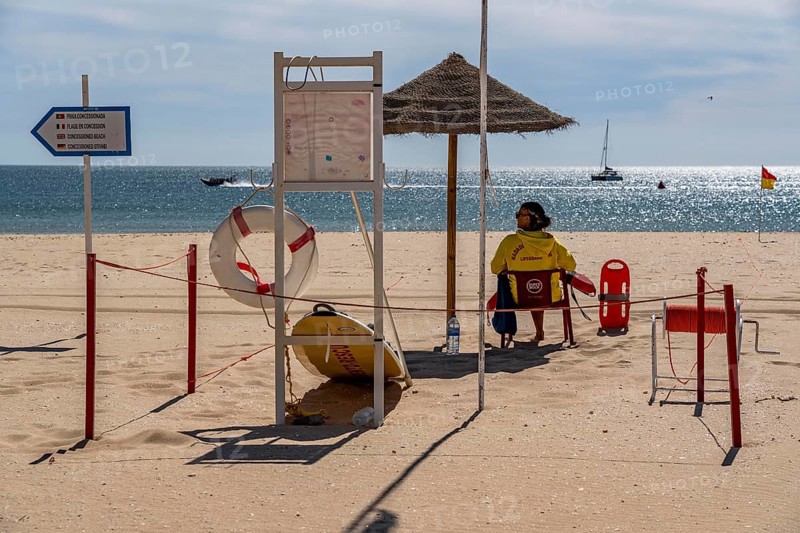 The Praia de São Roque beach, east of Lagos town centre, quite empty, lifeguards on duty, off-season, in the west of the Algarve, Portugal