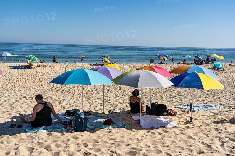 Kilometre-long sandy beach Praia do Barril, on the island off Santa Luzia, Algarve, Portugal