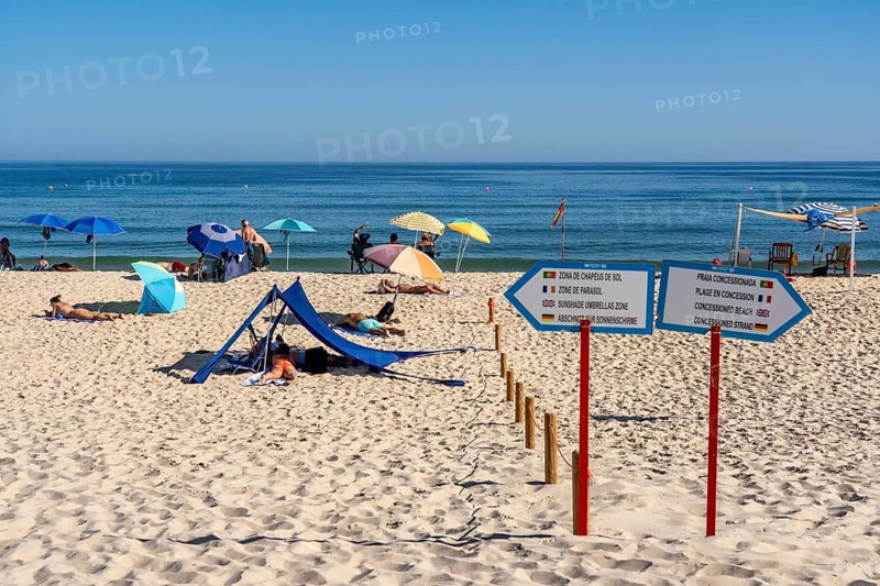 Kilometre-long sandy beach Praia do Barril, on the island off Santa Luzia, Algarve, Portugal