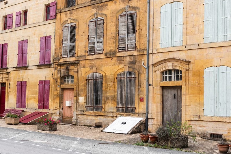 Historic house facade, abandoned building, yellow sandstone, Marville, Renaissance village, Département Meuse, Grand Est, France