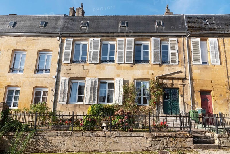 Renovated house facade, historic building, yellow sandstone, Marville, Renaissance village, Département Meuse, Grand Est, France
